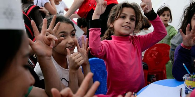 Accem y Cruz Roja Cuenca organizan una cadena humana  con motivo del Día del Refugiado